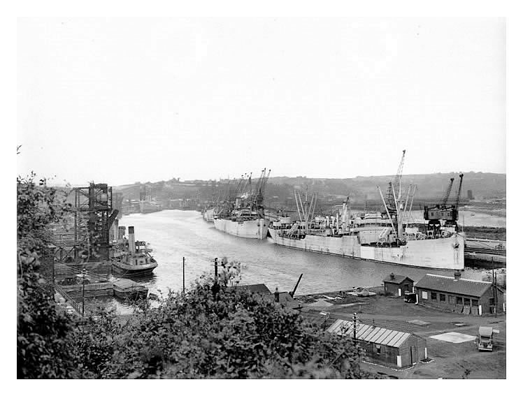 Armed merchantmen loading/unloading at the Penarth Docks during 1942. 