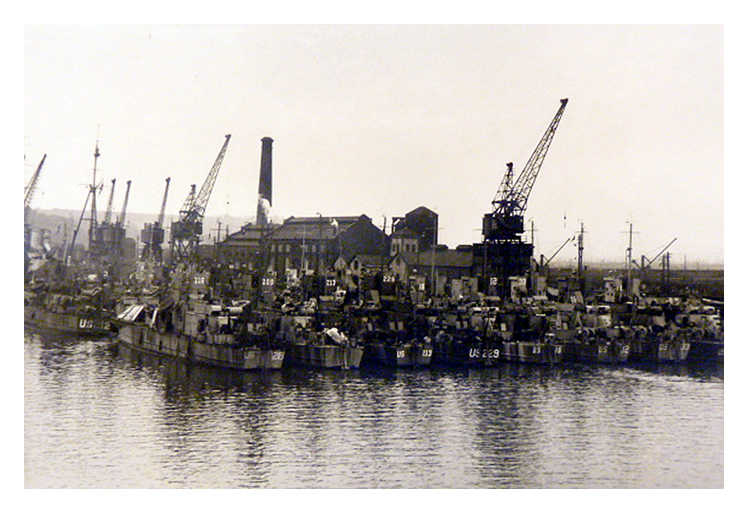 1943-4 - Another view of the LST's moored up close to the hydraulic engine house.