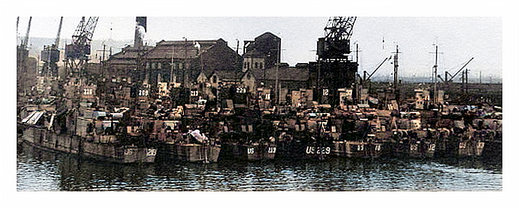 1943-4 - Another view of the LST's moored up close to the hydraulic engine house.