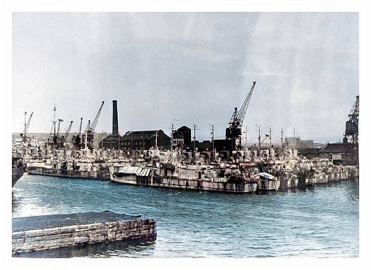 1943-4 - A view from the southern quay of the rows of LST's awaiting action. 