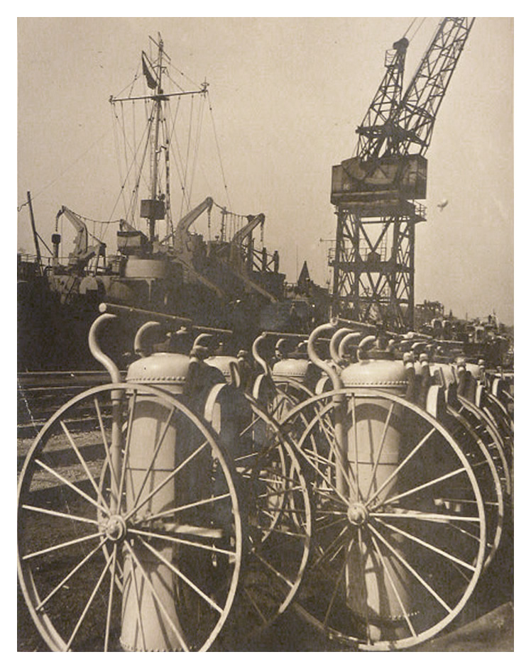 1943-4 - Another photograph showing rows of fire extinguishers lined up on the northern quayside of Penarth Dock. 