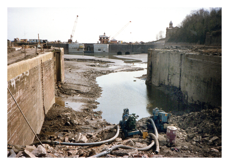 April 1987 - Construction of the Penarth Marina - A view from the dam across the lock between the basin and the main dock looking west toward the fortified entrance.