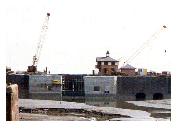 April 1987 - Construction of the Penarth Marina - A view from the dam across the lock between the basin and the main dock looking west toward the fortified entrance.