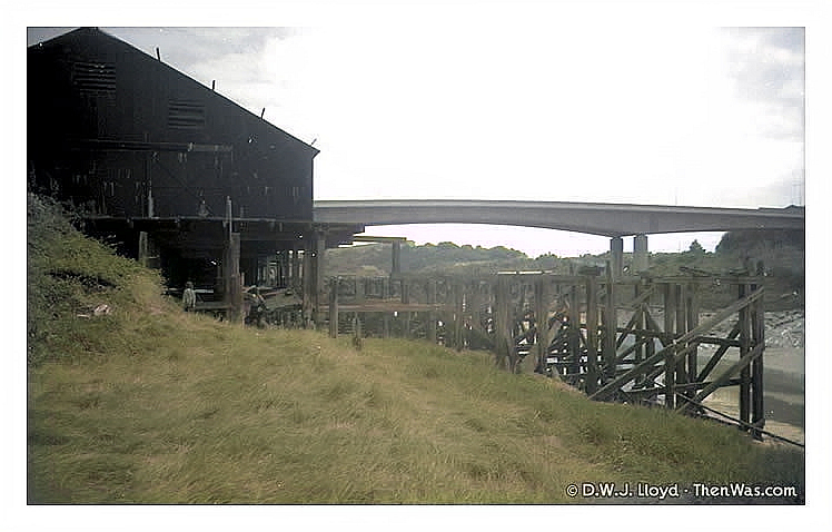 The approach to the old warehouse and tidal harbour moorings.