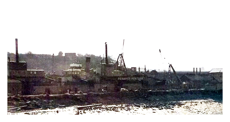 1940's: Another view from nearby Coal Tip No. 3 with the Penarth Pontoon clearly indicated on the opposite bank of the River Ely.