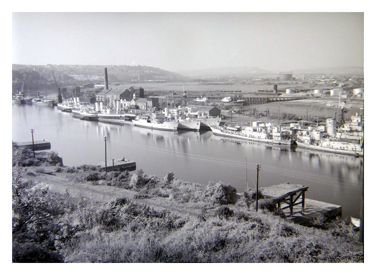 1950's - Royal Naval Reserve vessels laid up at Penarth Dock together with three White Funnel Fleet paddle steamers. 