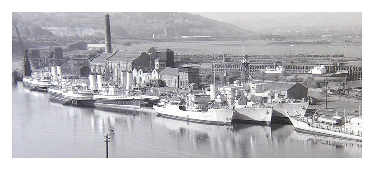 1950's - Royal Naval Reserve vessels laid up at Penarth Dock together with three White Funnel Fleet paddle steamers. 