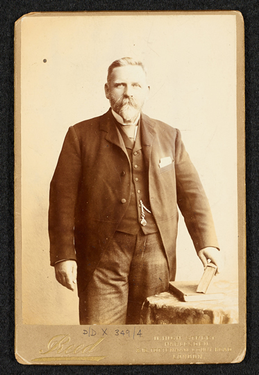 A studio portrait of George Rutter, photographed by Reed of Harlesden and 16 Tottenham Court Road, London in c.1900.
