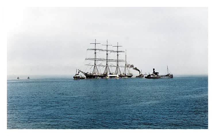'Passat' under tow of the tug 'Falcon' together with an unknown tug astern of her as she heads into Penarth Dock during October 1949.