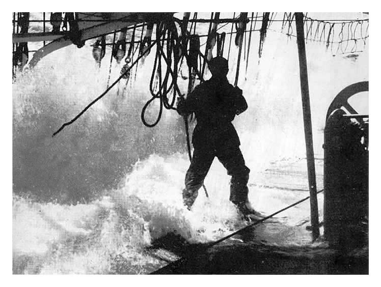 Clearing tangled buntlines on main deck in a gale