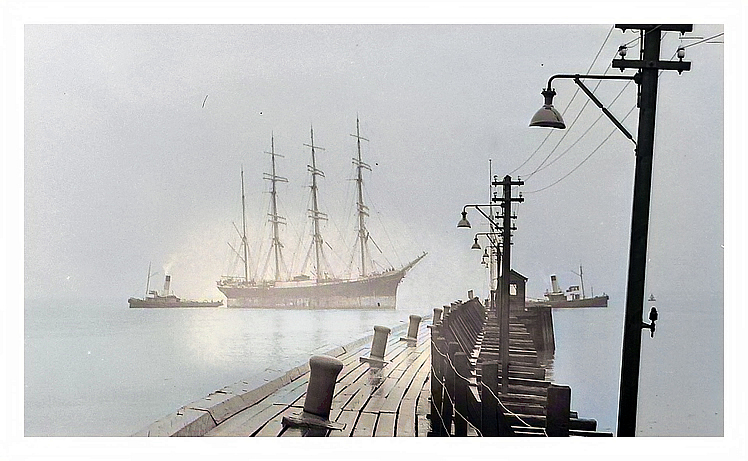 1950 - The Finnish barque 'Passat' under tow of two tugs approaching the southern entrance pier of Penarth Dock.