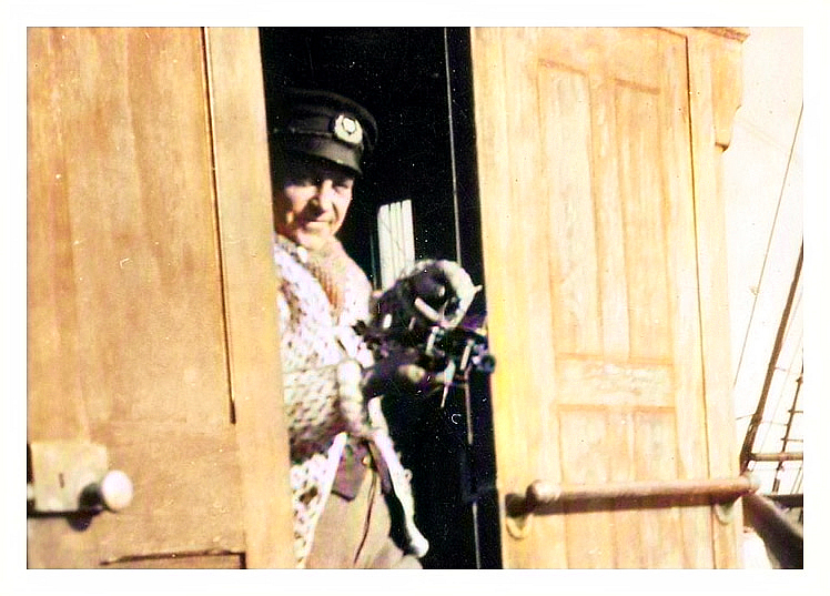 Captain Ivar Hagerstrand 'taking the sun' (taking a sextant reading) on board the 'Passat'.
