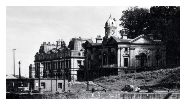 1950's - Penarth - Entrance to Docks - 'Above the quay is the old Customs House. The docks which cover 26 acres were opened in 1865. Photograph by Raymond Moore.' 