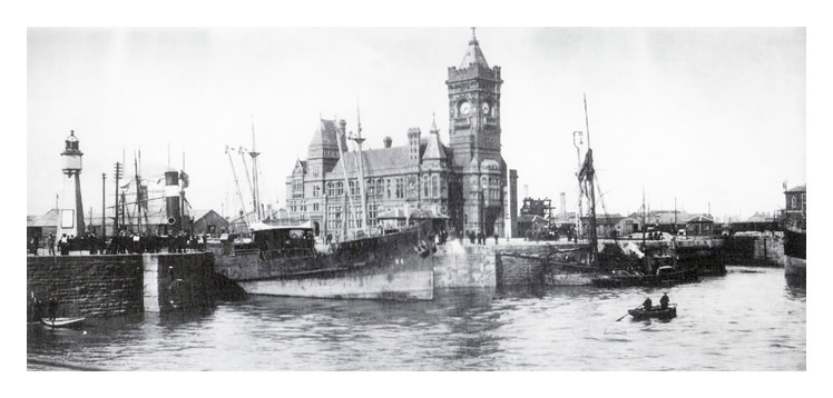 c.1910 - The trow 'Caroline' - awaiting near the entrance to the Bute West Dock at Cardiff together with a steam tug, probably the Falmouth tug 'Sylph.'