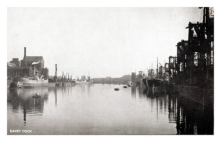 Barry Dock - Coal tips in No. 2 dock with the Atlantic Mill of of J. H. Rank & Company. 