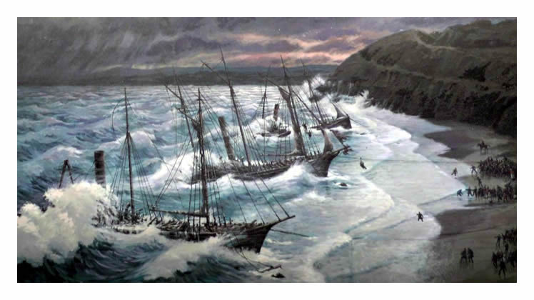 A view of the colliers 'Cintra,' 'Bessie' and 'Vulture' distant, wrecked at Carbis Bay during November 1893. 