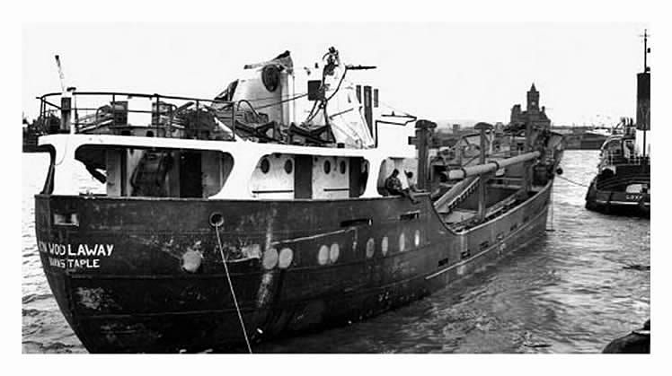 The sand dredger 'Ron Wollaway' of Barnstable under tow to Cardiff prior to her repair at Penarth Dock.