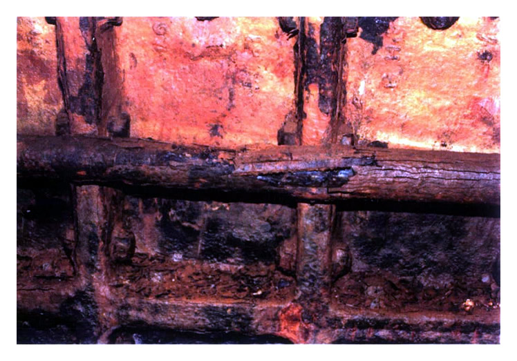 Plate 3/25 - Ring 146 - Disintegration of disused 75mm diameter cast iron electric cable conduit. 