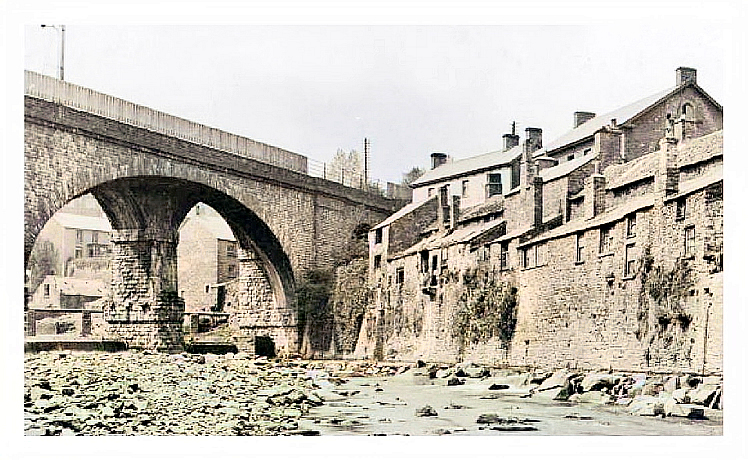 The bridge as described in the article is the skewed viaduct spanning the River Rhondda at Newbridge to a design of Mr. I. K. Brunel.