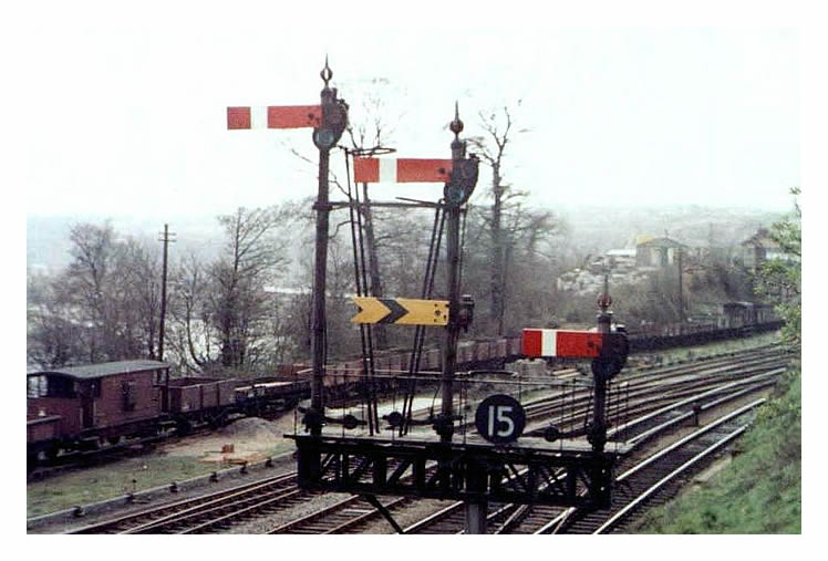 1965- Between Cogan Junction & Llandough signal boxes with views of the River Ely and Penarth Dock through the trees. 