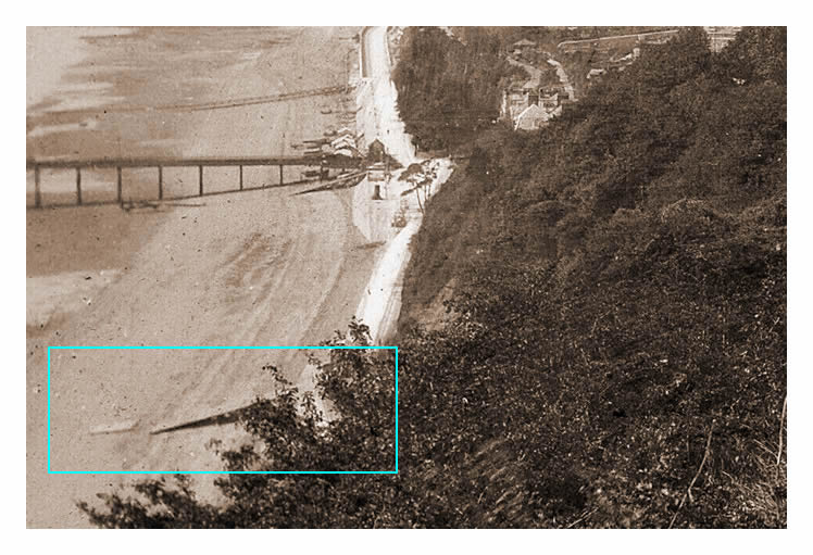 An enlargement of a photograph taken from Penarth Head looking towards the beach and showing the new location of the lifeboat station (from 1884) where the 'Joseph Denman' was housed ready for rescue.