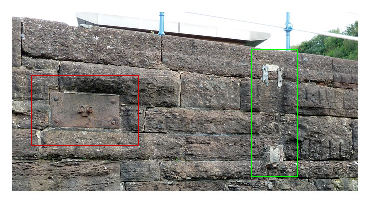 October 2023 - In the lower image, note the mounting plate for the heavy chain.