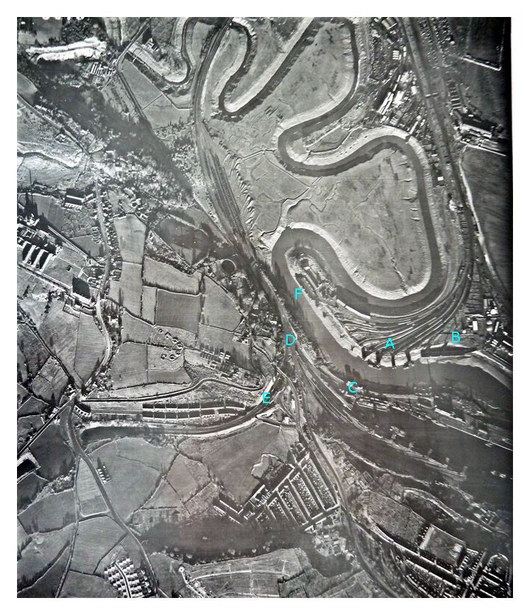 4th December 1946 - Image 3075 - The meandering River Ely leads to the Victoria Wharf, then the four remaining coal tips of the Ely Tidal Harbour and the former Iron Ore Wharf, now used for petroleum products on the northern side.