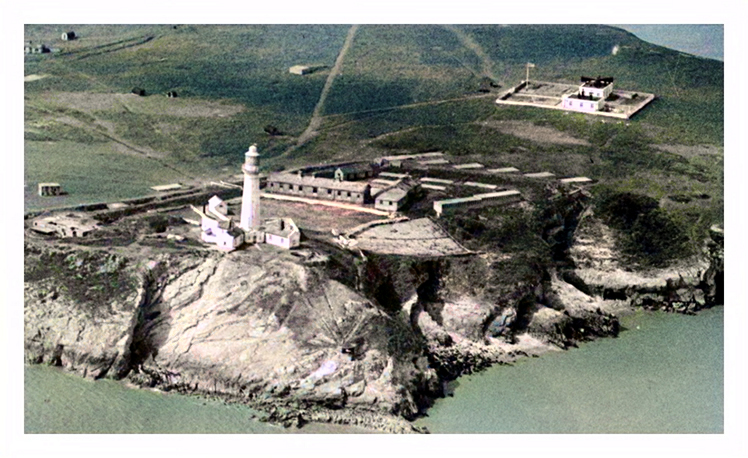 Lighthouse Barracks and Fort - A colourised aerial view of the lighthouse and fog horn, with the lighthouse fort foremost.